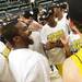 Michigan freshman Caris LeVert smiles in the middle of his teammates as they celebrate beating Florida to win the NCAA South Regional Championship and advancing to the Final Four at Cowboys Stadium on Sunday, March 31, 2013. Melanie Maxwell I AnnArbor.com